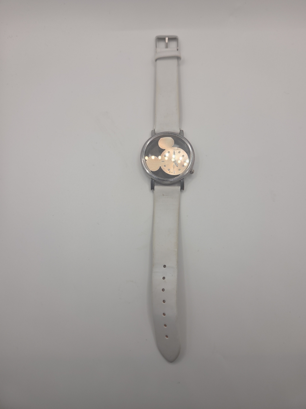 Vintage Disney Mickey Mouse wristwatch featuring a unique Mickey-shaped dial wit